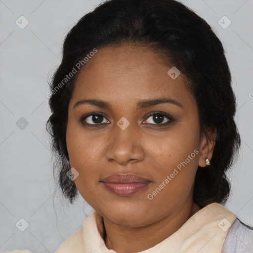 Joyful black young-adult female with medium  brown hair and brown eyes