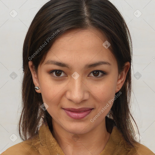 Joyful latino young-adult female with medium  brown hair and brown eyes