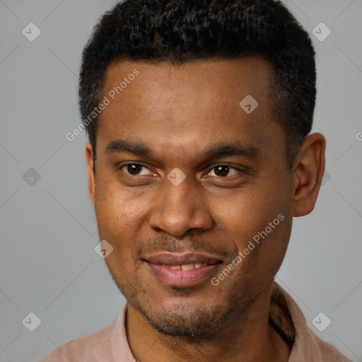 Joyful latino young-adult male with short  brown hair and brown eyes