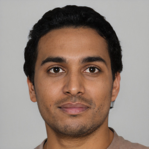 Neutral latino young-adult male with short  black hair and brown eyes