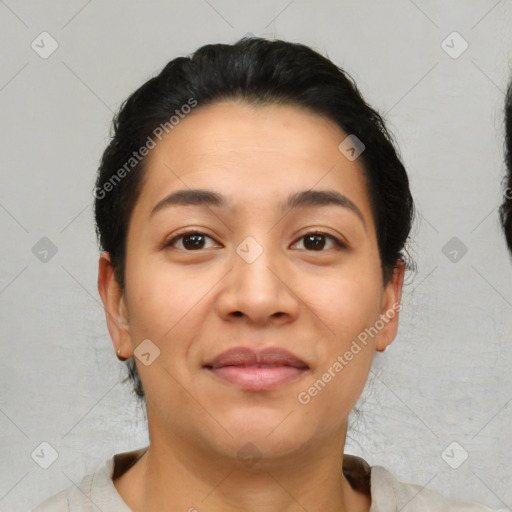 Joyful latino young-adult female with short  brown hair and brown eyes