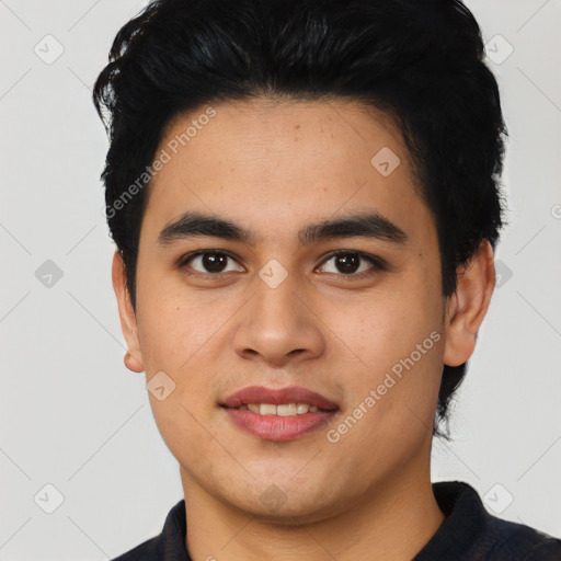 Joyful asian young-adult male with short  black hair and brown eyes