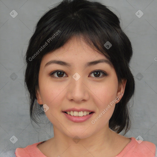 Joyful asian young-adult female with medium  black hair and brown eyes