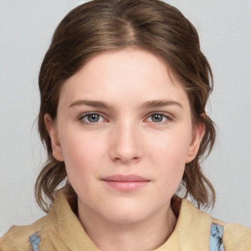 Neutral white young-adult female with medium  brown hair and grey eyes