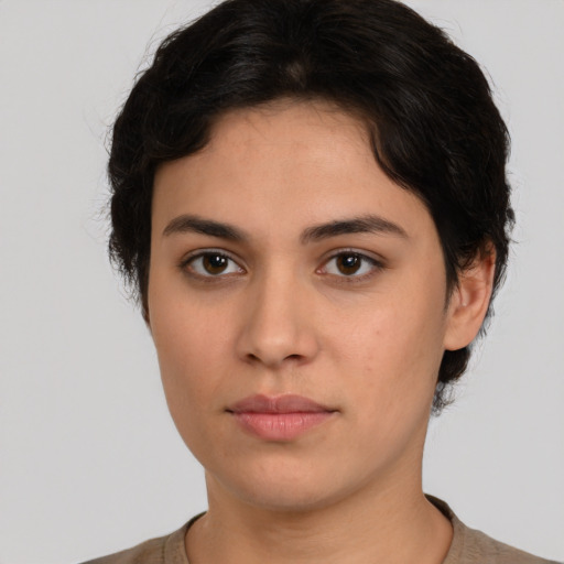 Neutral white young-adult female with short  brown hair and brown eyes