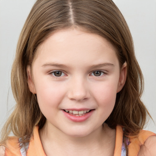 Joyful white child female with medium  brown hair and grey eyes