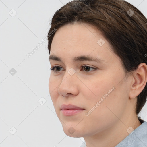 Neutral white young-adult female with short  brown hair and brown eyes