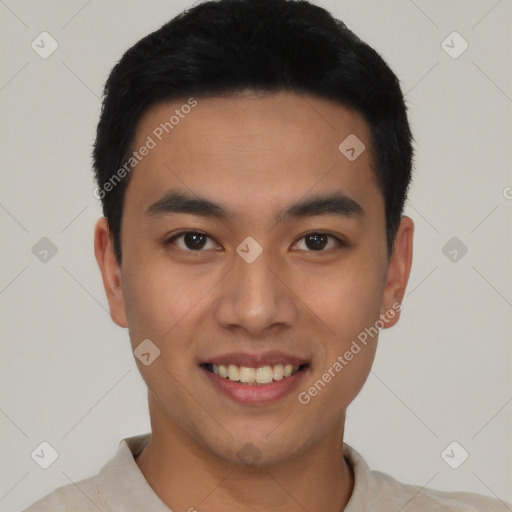 Joyful latino young-adult male with short  black hair and brown eyes