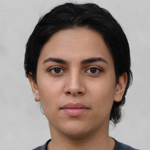 Neutral latino young-adult female with short  black hair and brown eyes