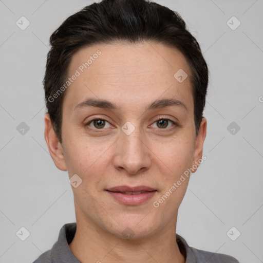 Joyful white young-adult female with short  brown hair and brown eyes