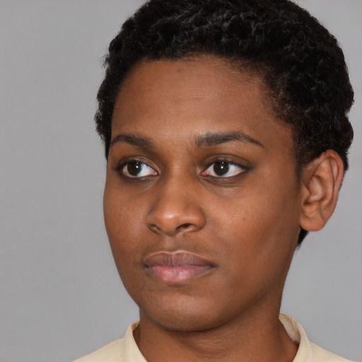 Neutral black young-adult female with short  black hair and brown eyes