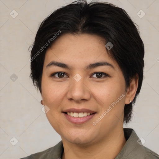 Joyful asian adult female with medium  brown hair and brown eyes