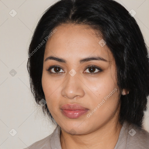 Joyful latino young-adult female with medium  black hair and brown eyes