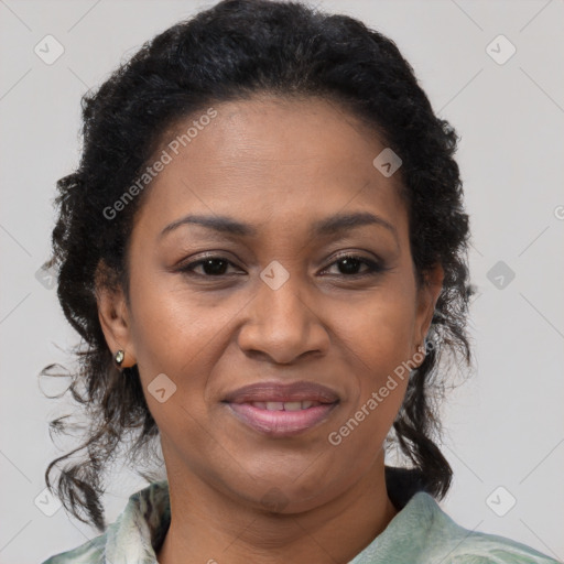 Joyful black adult female with medium  brown hair and brown eyes