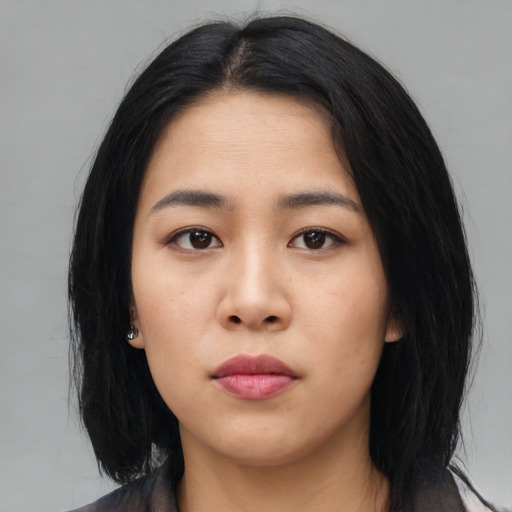 Neutral asian young-adult female with medium  black hair and brown eyes