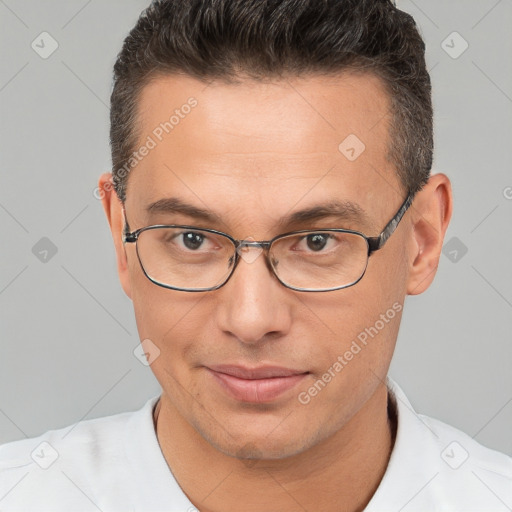 Joyful white adult male with short  brown hair and brown eyes