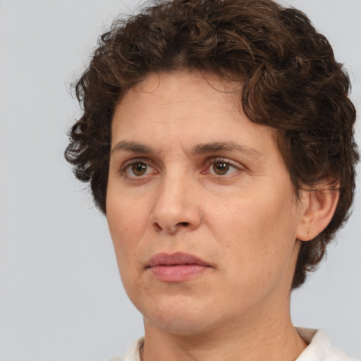 Neutral white adult female with short  brown hair and brown eyes