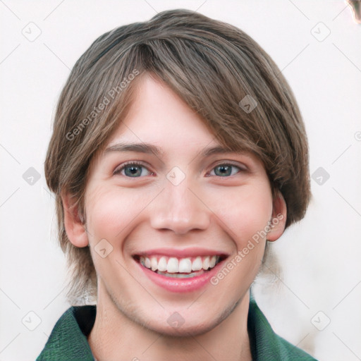 Joyful white young-adult female with short  brown hair and blue eyes