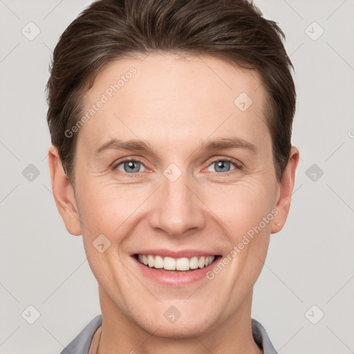 Joyful white adult female with short  brown hair and grey eyes