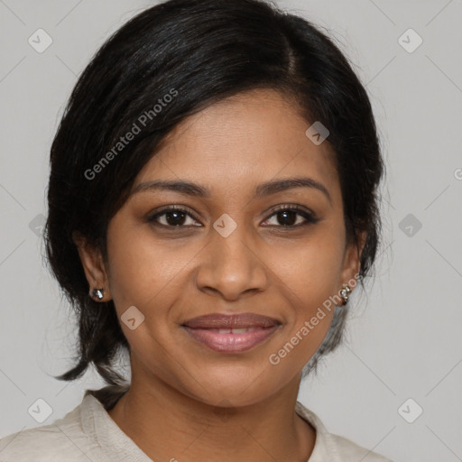 Joyful black young-adult female with medium  brown hair and brown eyes