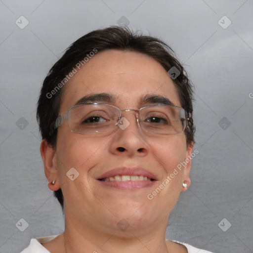 Joyful white adult female with short  brown hair and brown eyes