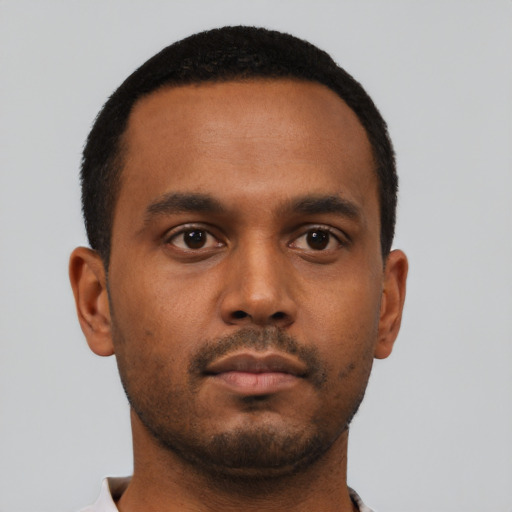 Neutral black young-adult male with short  black hair and brown eyes