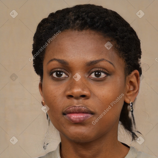 Neutral black young-adult female with short  black hair and brown eyes