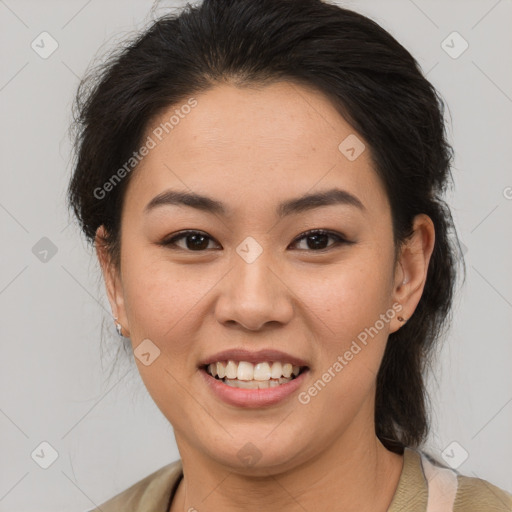 Joyful latino young-adult female with medium  brown hair and brown eyes