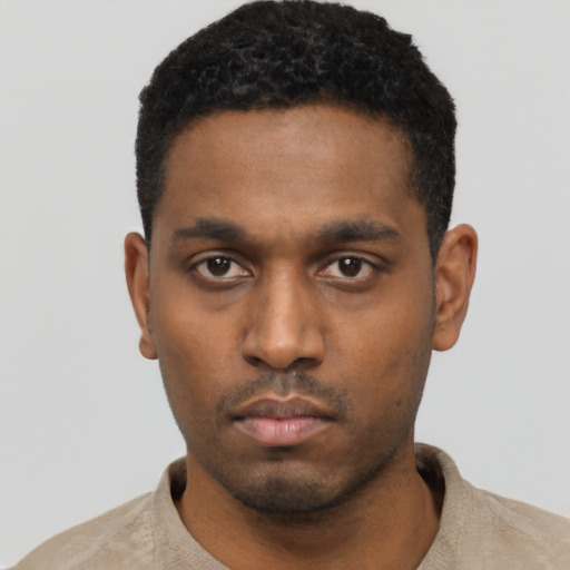 Neutral black young-adult male with short  black hair and brown eyes