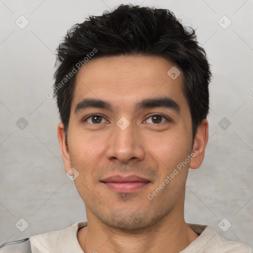 Joyful white young-adult male with short  black hair and brown eyes