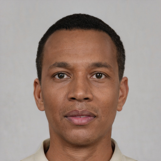 Neutral black adult male with short  black hair and brown eyes