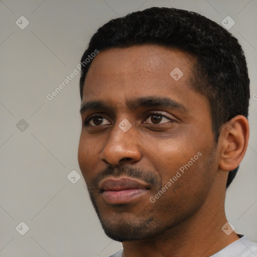 Neutral black young-adult male with short  black hair and brown eyes