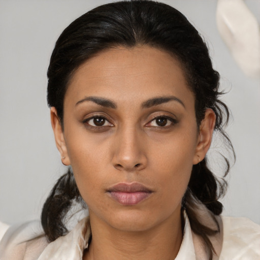 Neutral latino young-adult female with medium  brown hair and brown eyes