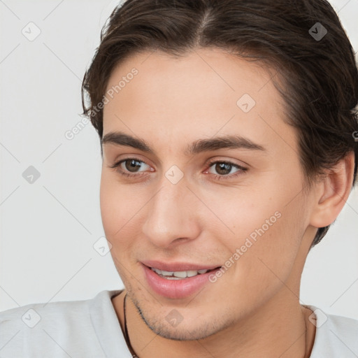 Joyful white young-adult female with short  brown hair and brown eyes