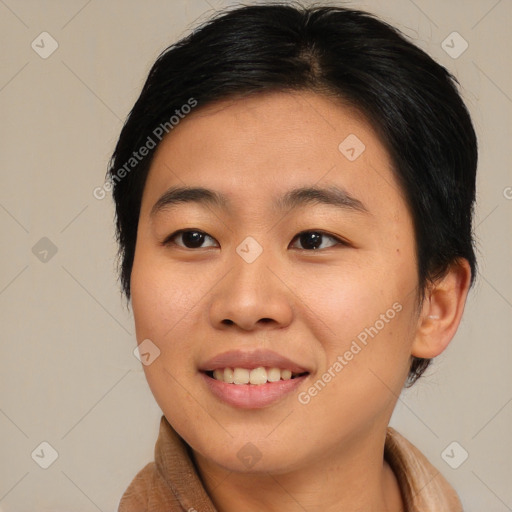 Joyful asian young-adult female with medium  brown hair and brown eyes