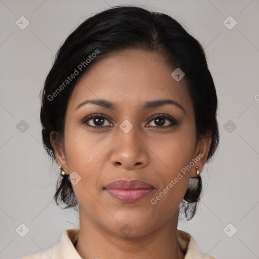 Joyful latino young-adult female with medium  brown hair and brown eyes