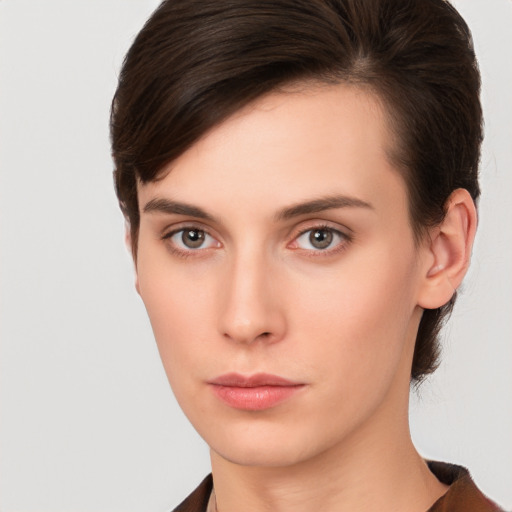 Neutral white young-adult female with short  brown hair and brown eyes