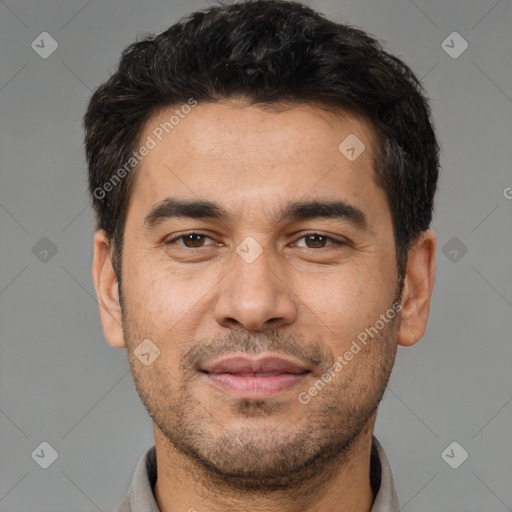 Joyful white young-adult male with short  black hair and brown eyes