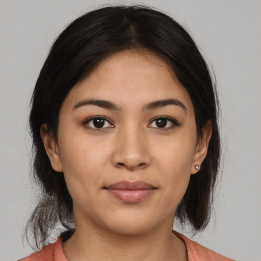 Joyful asian young-adult female with medium  brown hair and brown eyes