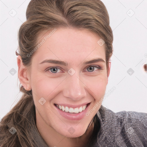 Joyful white young-adult female with long  brown hair and blue eyes