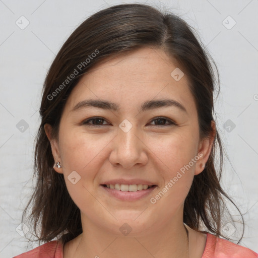 Joyful white young-adult female with medium  brown hair and brown eyes