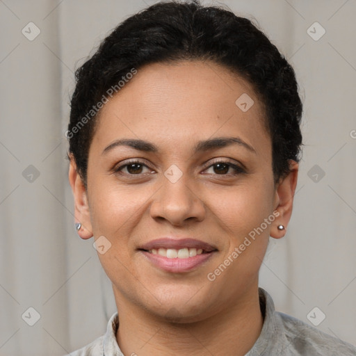 Joyful latino young-adult female with short  brown hair and brown eyes