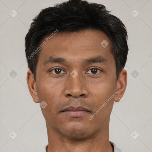 Neutral asian young-adult male with short  black hair and brown eyes