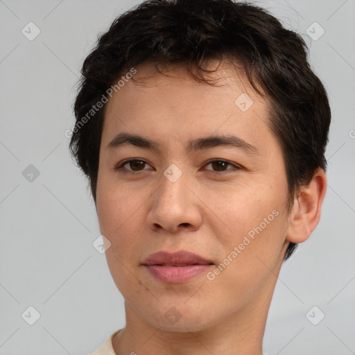 Joyful asian young-adult male with short  brown hair and brown eyes