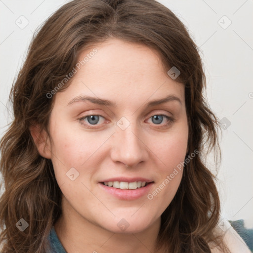 Joyful white young-adult female with long  brown hair and blue eyes