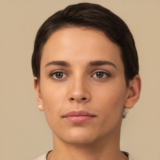 Neutral white young-adult female with short  brown hair and brown eyes