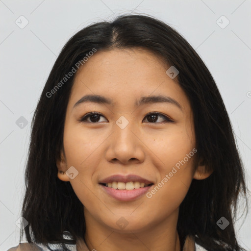 Joyful latino young-adult female with medium  black hair and brown eyes