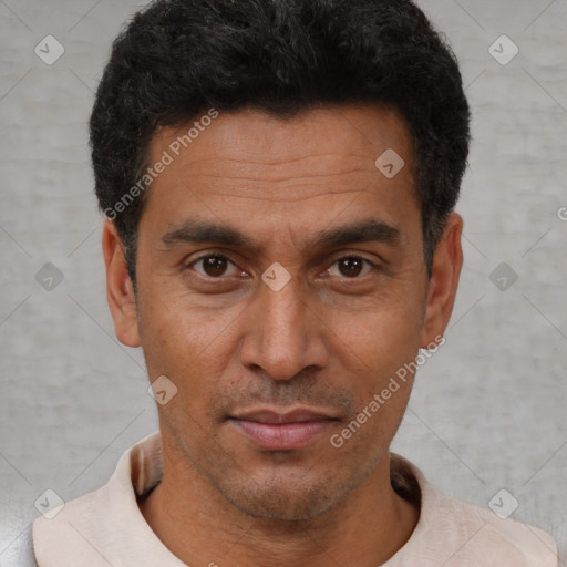 Neutral latino adult male with short  black hair and brown eyes