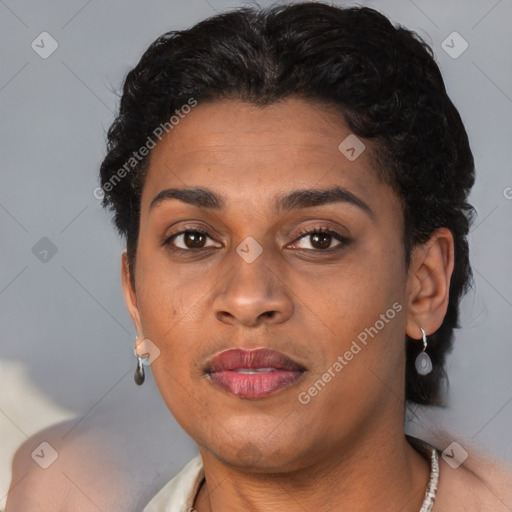 Joyful latino young-adult female with short  brown hair and brown eyes