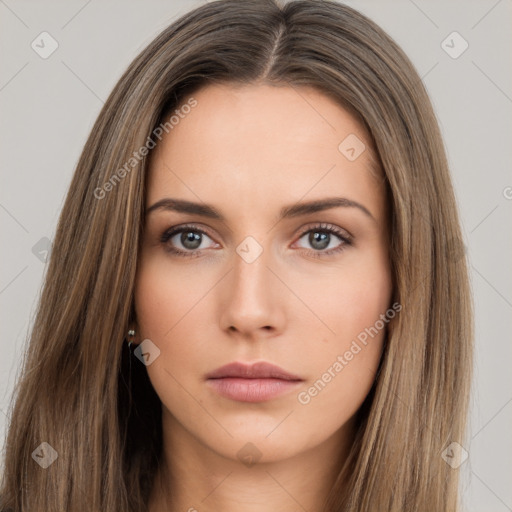 Neutral white young-adult female with long  brown hair and brown eyes